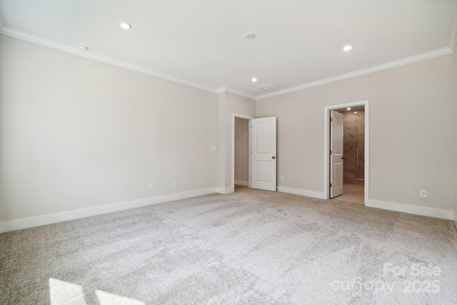 unfurnished bedroom with ensuite bathroom, light colored carpet, and crown molding