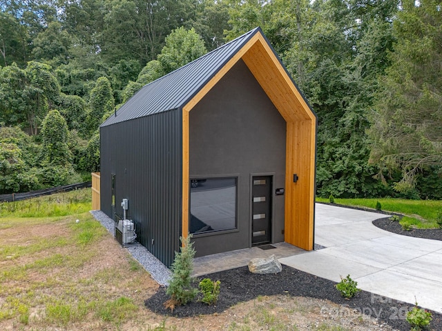 view of outdoor structure with a garage