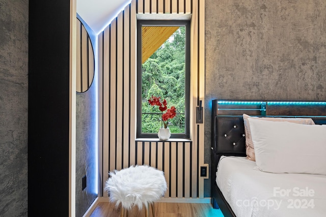 bedroom featuring wood-type flooring