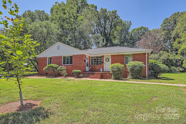 single story home featuring crawl space, brick siding, and a front yard