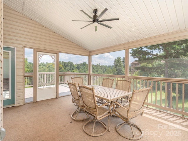 209 Velvet Ln, Weaverville, NC 28787 - sunroom / solarium featuring outdoor dining space, a ceiling fan, lofted ceiling, and view of wooded area