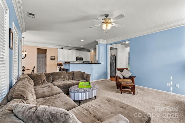 carpeted living room with crown molding, recessed lighting, visible vents, a ceiling fan, and baseboards