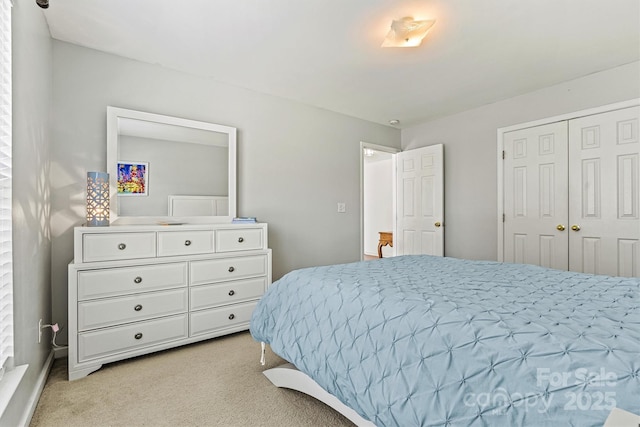 bedroom with light colored carpet