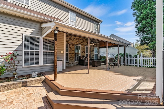 wooden deck featuring fence