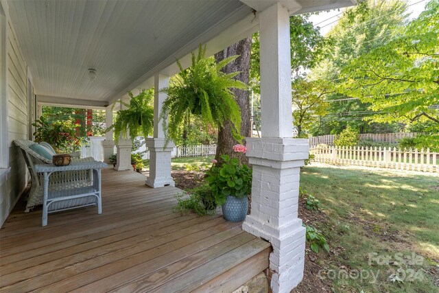 404 Montreat Rd, Black Mountain, NC 28711 - wooden deck with a porch and fence