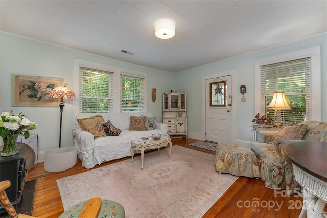 404 Montreat Rd, Black Mountain, NC 28711 - living area featuring baseboards, visible vents, and wood finished floors