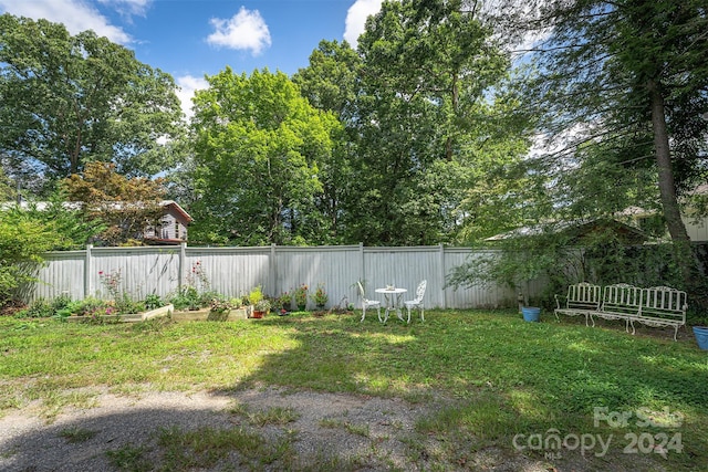 404 Montreat Rd, Black Mountain, NC 28711 - view of yard with a garden and a fenced backyard