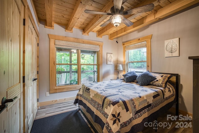 bedroom with ceiling fan, wood ceiling, beam ceiling, and wood-type flooring