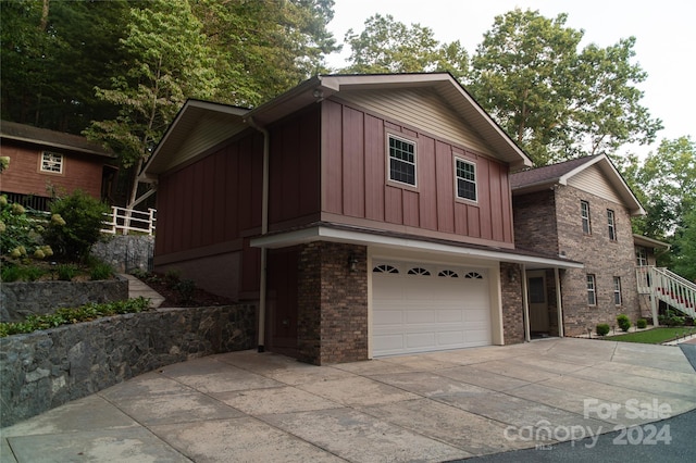 view of front of property with a garage