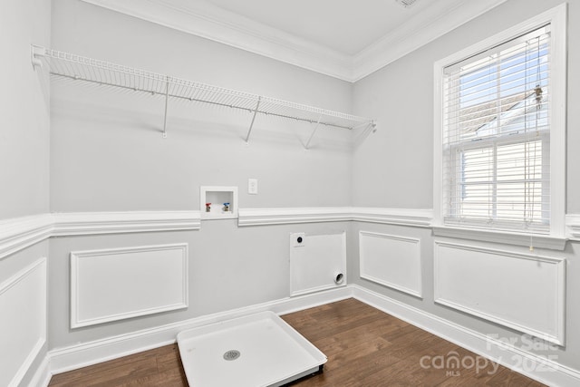 laundry area with a wealth of natural light, ornamental molding, hookup for a washing machine, and hookup for an electric dryer