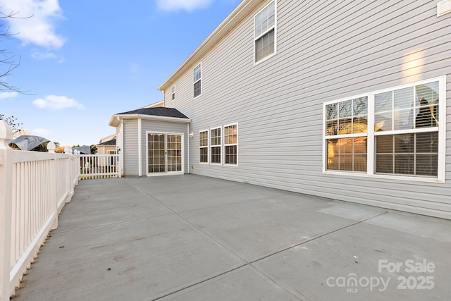 back of house with a patio area