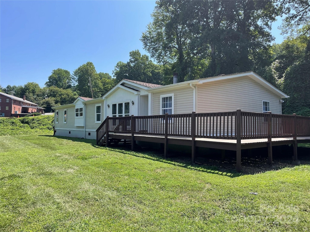 1217 Franklin Grove Church Rd, Bryson City, NC 28713 - rear view of house with crawl space, a lawn, and a wooden deck