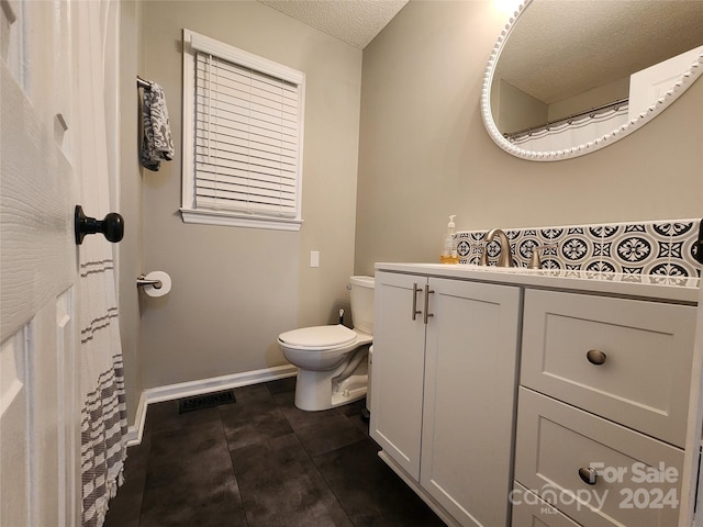 120 Old Belwood Rd, Lawndale, NC 28090 - full bath featuring visible vents, baseboards, toilet, a textured ceiling, and vanity