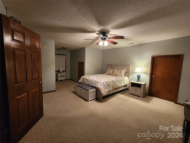 120 Old Belwood Rd, Lawndale, NC 28090 - bedroom with light carpet, visible vents, a textured ceiling, and ceiling fan