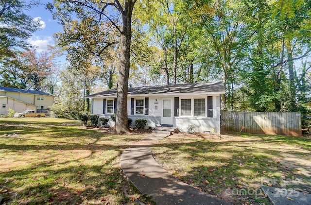 view of front of home with a front yard