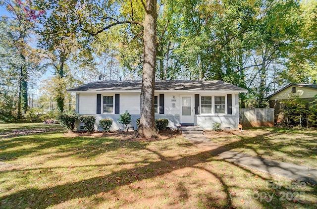 single story home with a front yard