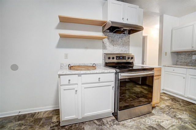 kitchen with electric range, white cabinets, and tasteful backsplash