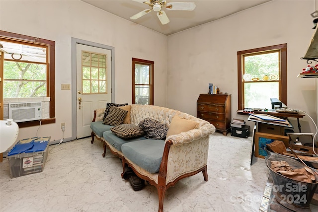 living room featuring plenty of natural light, ceiling fan, and cooling unit