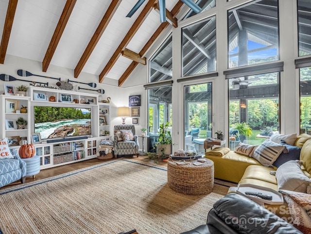 living room featuring beamed ceiling, high vaulted ceiling, and wood-type flooring