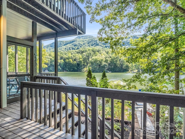 wooden terrace with a water view