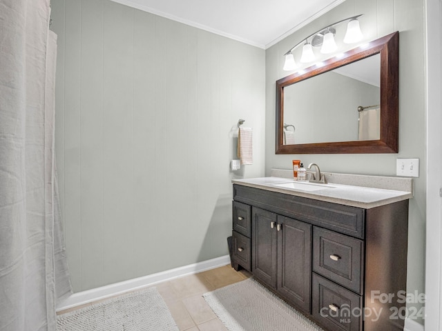 bathroom with crown molding, vanity, a shower with shower curtain, and tile patterned flooring