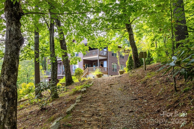 30 Lower Tanglewood Rd E Unit 1, Lake Toxaway, NC 28747 - rear view of house featuring a balcony