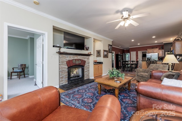 30 Lower Tanglewood Rd E Unit 1, Lake Toxaway, NC 28747 - living room with ornamental molding, a ceiling fan, baseboards, recessed lighting, and a warm lit fireplace