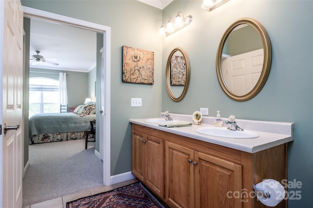 30 Lower Tanglewood Rd E Unit 1, Lake Toxaway, NC 28747 - ensuite bathroom featuring ornamental molding, double vanity, baseboards, and a ceiling fan