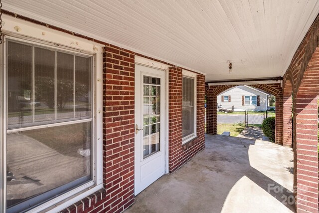 view of patio featuring a porch