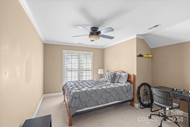 carpeted bedroom with ornamental molding, lofted ceiling, and ceiling fan