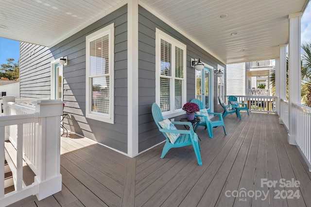 wooden deck featuring a porch