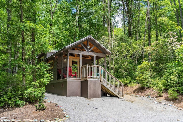 78 Smiling Fox Trl, Brevard, NC 28712 - view of front of house with crawl space, a wooded view, and stairs