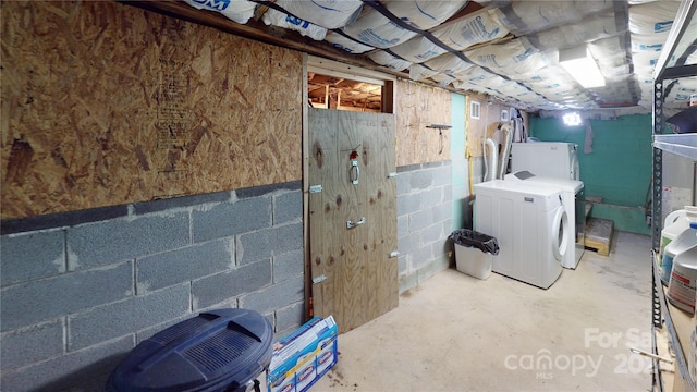 basement featuring separate washer and dryer