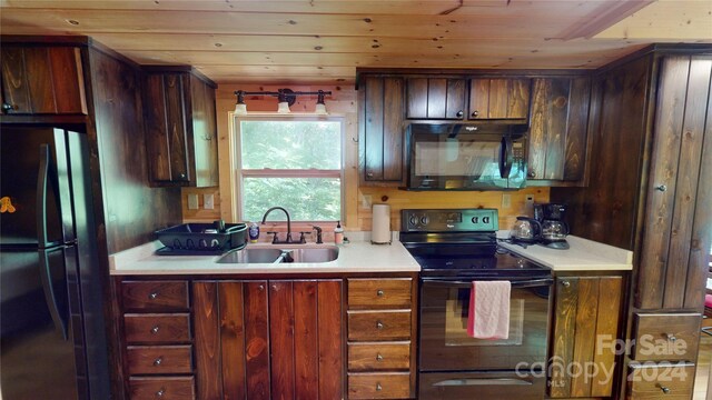 kitchen featuring sink, wooden ceiling, and black appliances