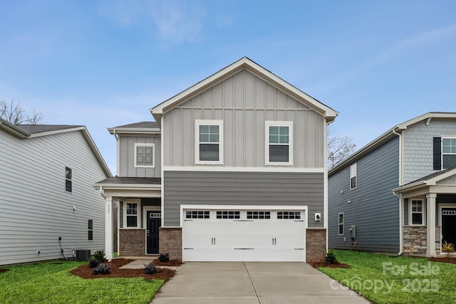 craftsman-style home with a front lawn, central AC unit, and a garage