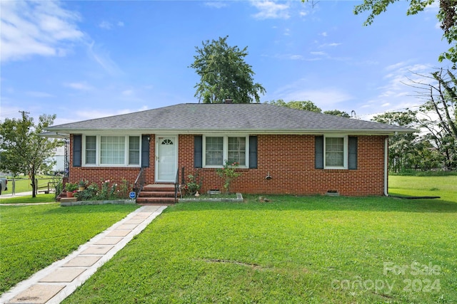 single story home featuring crawl space, brick siding, and a front lawn