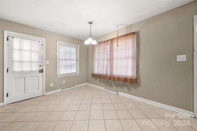 unfurnished dining area featuring a notable chandelier, a baseboard radiator, and light tile patterned floors