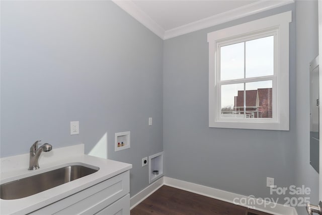 laundry room featuring electric dryer hookup, ornamental molding, a sink, cabinet space, and hookup for a washing machine