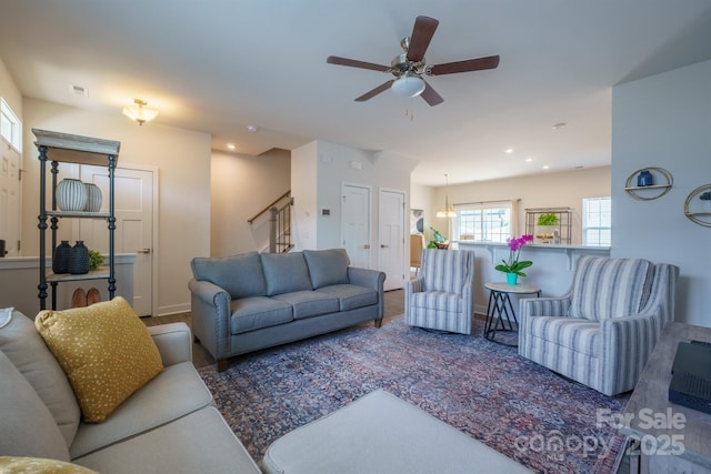 living room with ceiling fan