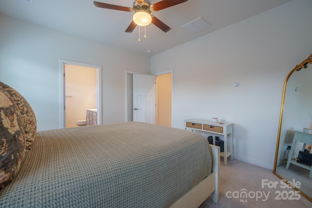 bedroom with ceiling fan and light colored carpet