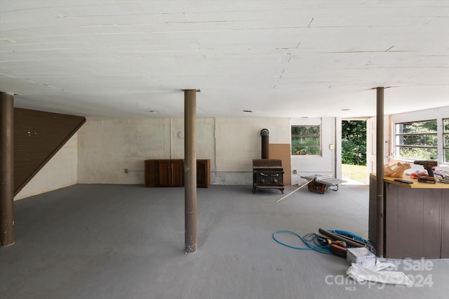 basement featuring a wood stove