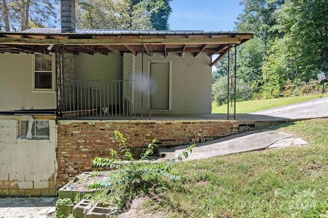 view of home's exterior featuring a yard