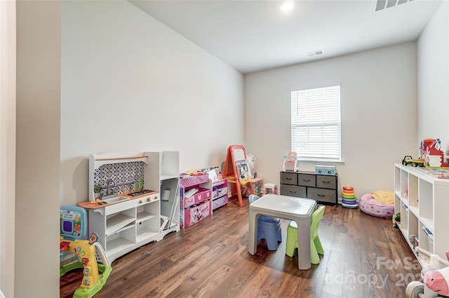 playroom with wood finished floors and visible vents