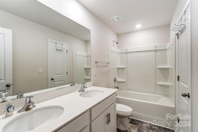 full bath featuring toilet, bathing tub / shower combination, a sink, and visible vents