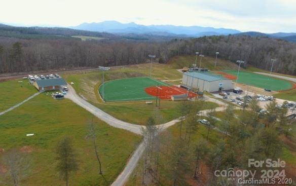 birds eye view of property with a rural view