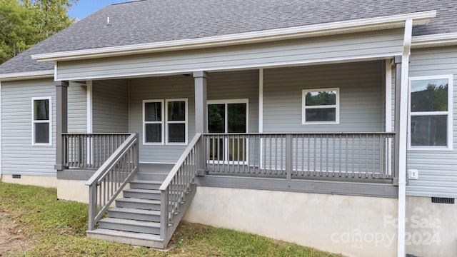 entrance to property with a porch