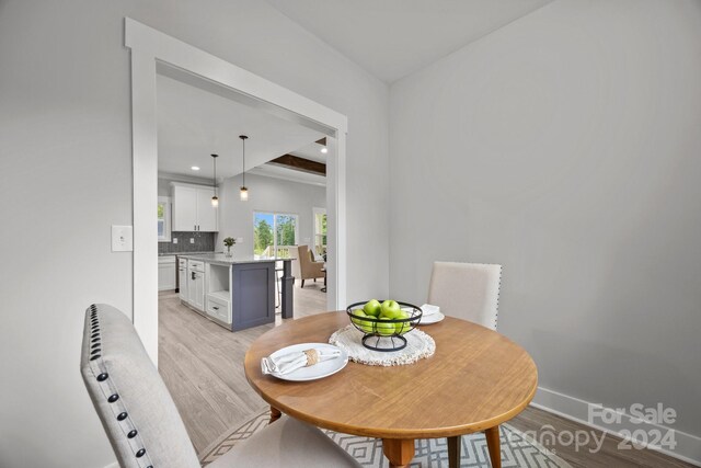 dining room with light wood-type flooring