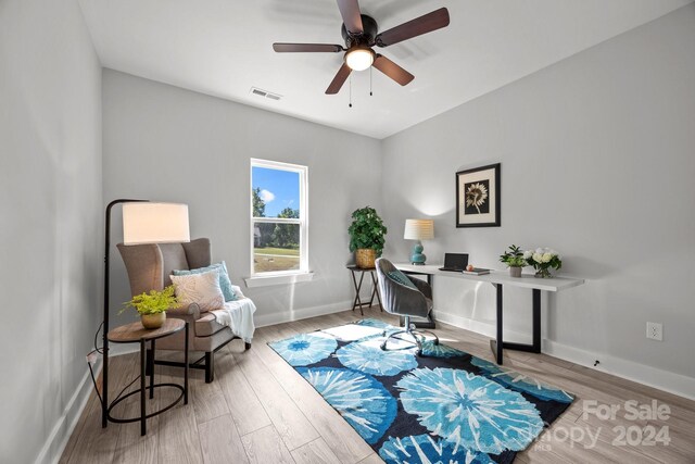 office area featuring ceiling fan and light wood-type flooring