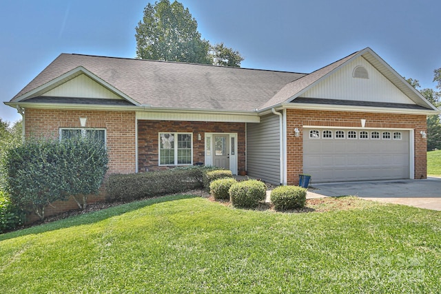 view of front facade featuring a front yard and a garage