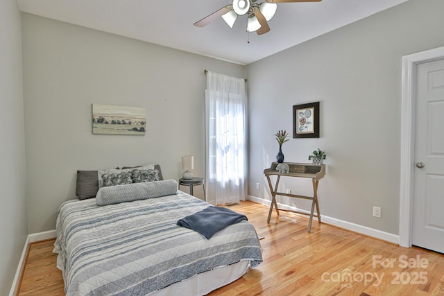 bedroom featuring ceiling fan and wood-type flooring